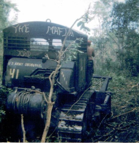 Protecting Rome Plows near Tay Ninh, crashing down Jungle